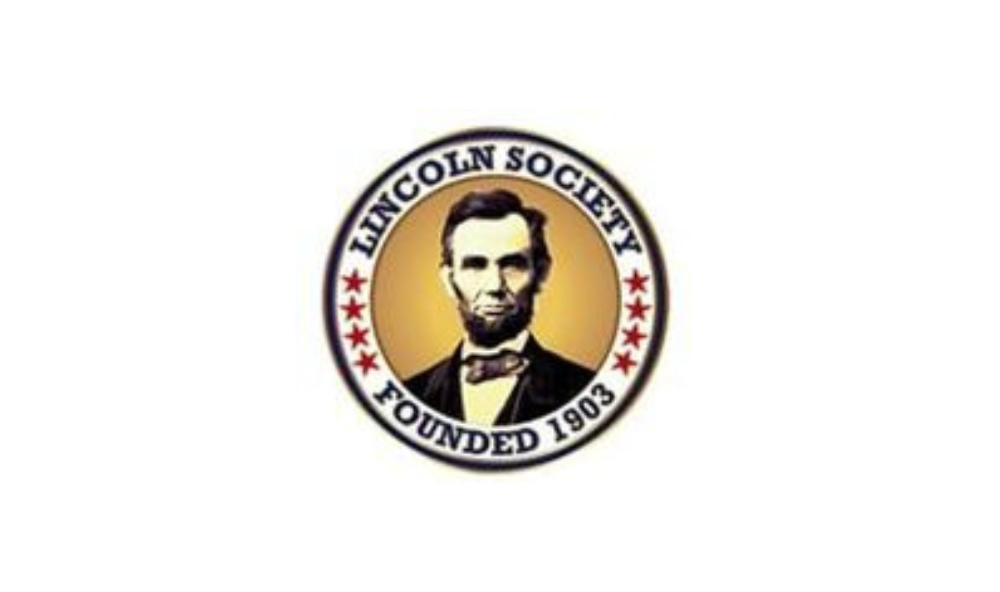 Logo for the Lincoln Society. Says “Lincoln Society, FOunded 1903” with 4 red stars on either side and an image of Abraham Lincoln in the center
